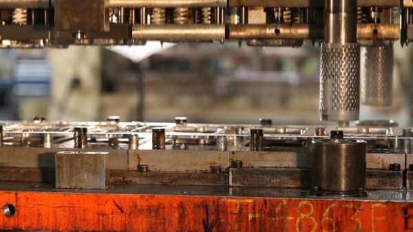 progressive-die-stamping-automation Progressive Die Stamping Process Automation